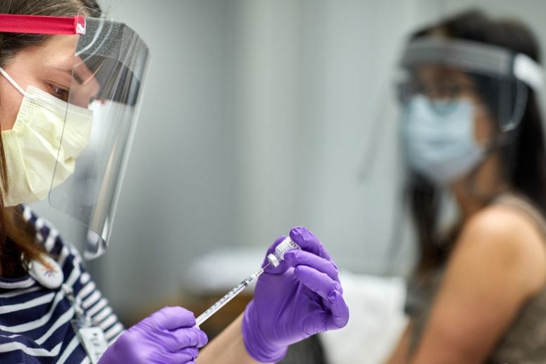 Health Care Workers Receiving COVID 19 Vaccine