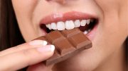 Woman Eating Chocolate